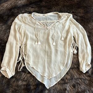 Elegant Haute Hippie Cream Blouse with Tassel Details